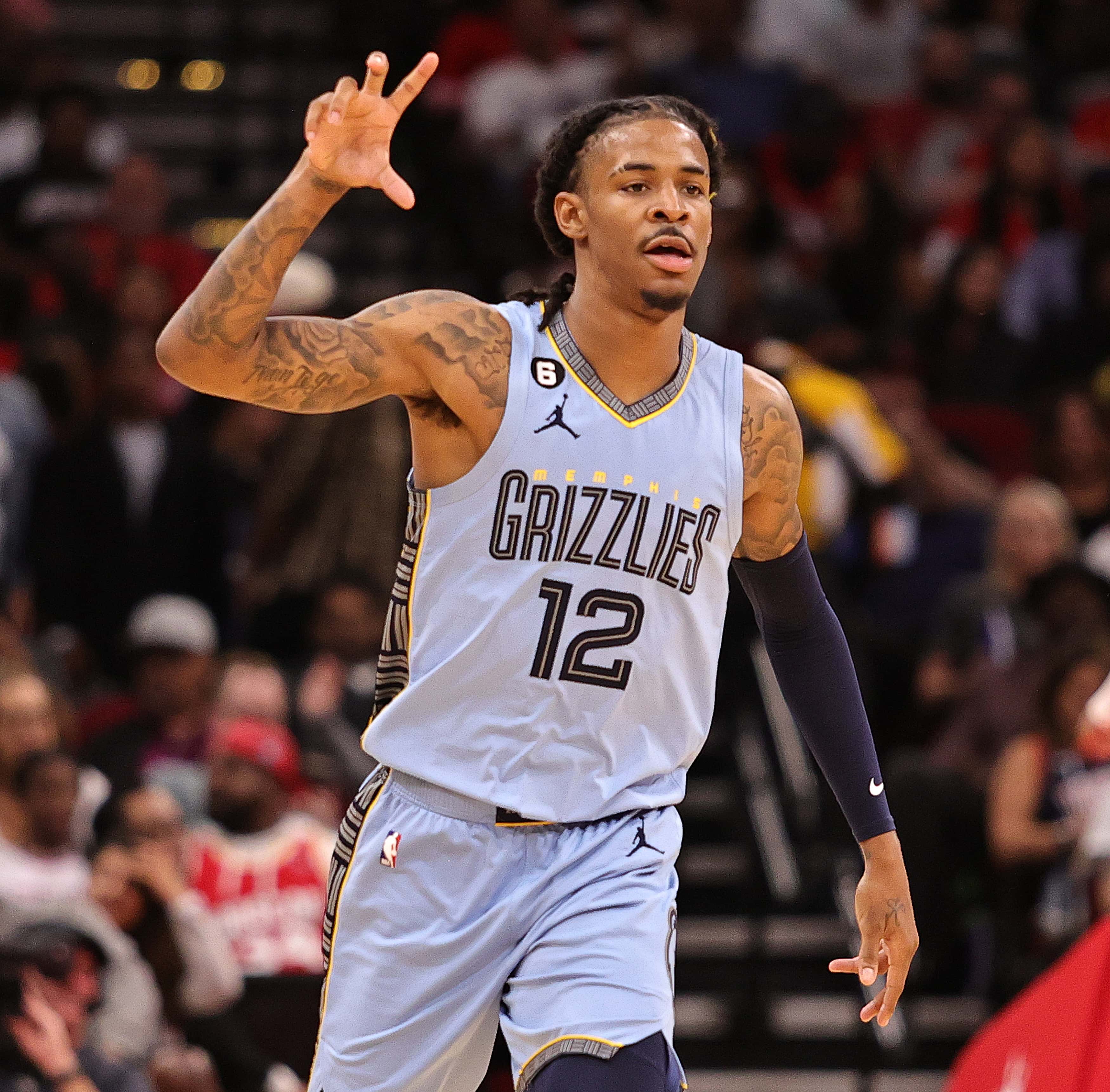 HOUSTON, TEXAS - OCTOBER 21: Ja Morant #12 of the Memphis Grizzlies celebrates a three point basket 