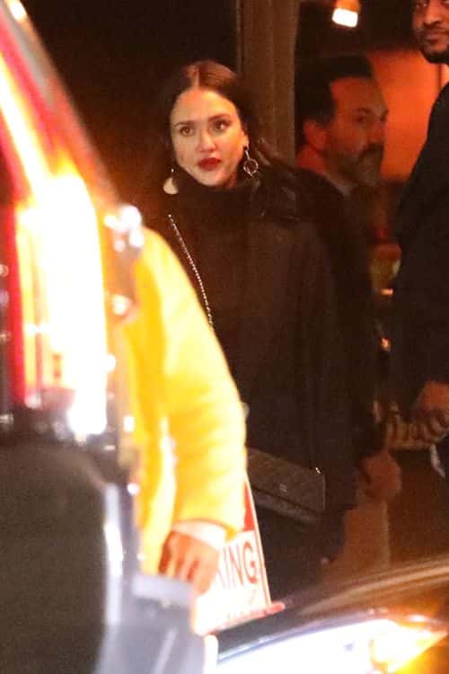 Jessica Alba was seen donning an all black outfit, featuring a bold red lip (Backgrid)