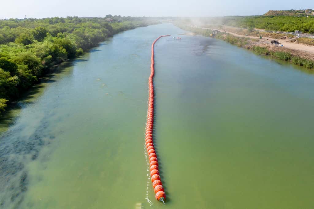 EAGLE PASS, TEXAS - JULY 18: Buoy barriers are installed and situated in the middle of the Rio Grande river on July 18, 2023 in Eagle Pass, Texas. Texas has begun installing buoy barriers along portions of the Rio Grande river in an effort to deter illegal border crossings. (Photo by Brandon Bell/Getty Images)