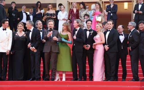 (L-R) Rupert Friend, Rita Wilson, Tom Hanks, Alexandre Desplat, Bryan Cranston, Maya Hawke, Wes Anderson, Adrien Brody, Scarlett Johansson, Matt Dillon, Fisher Stevens, Steve Carell and Stephen Park attend the 