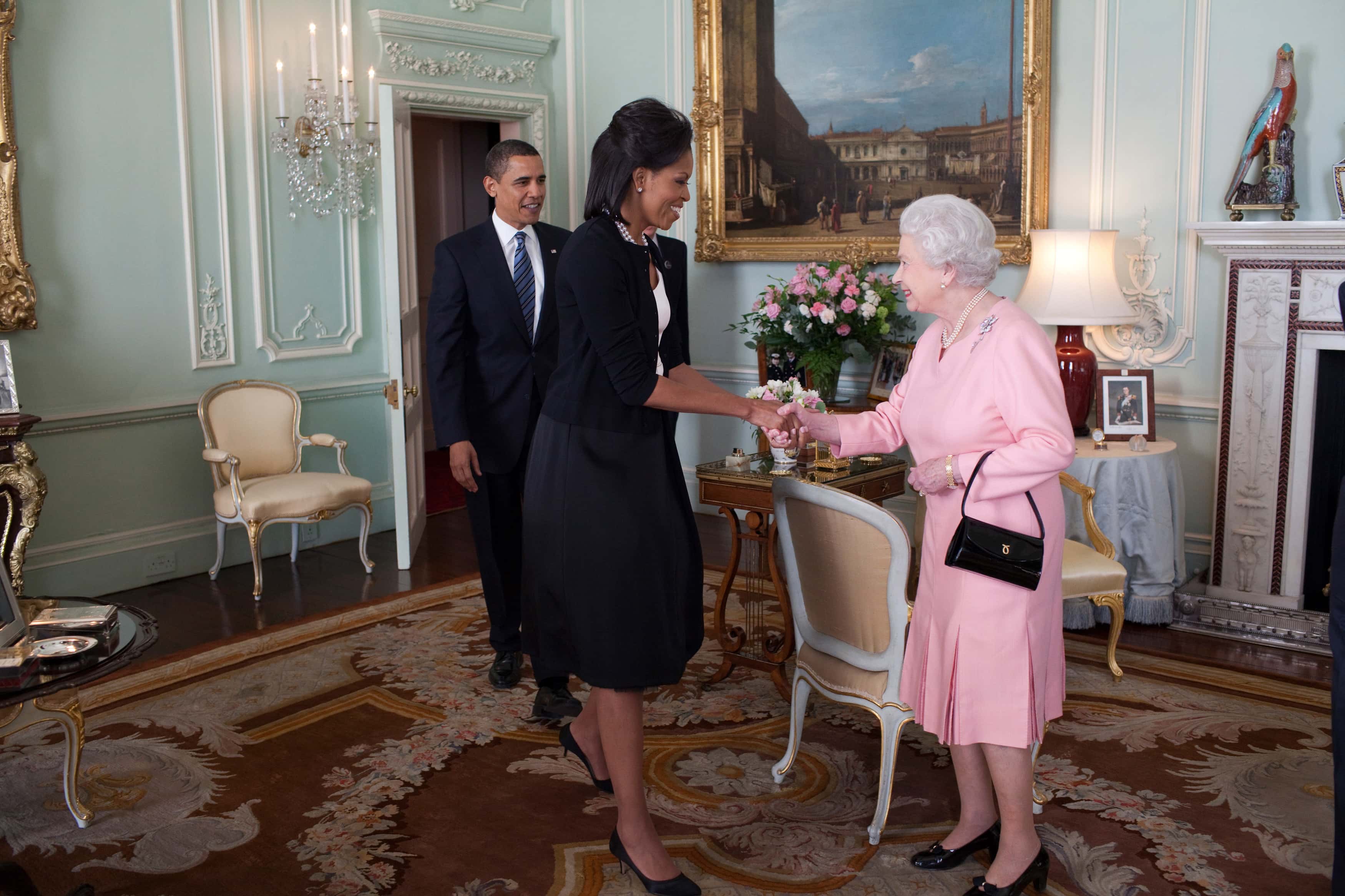 In this handout provide by the White House, U.S. President Barack Obama and First Lady Michelle Obama are welcomed by Her Majesty Queen Elizabeth II to Buckingham Palace on April 1, 2009 in London, England. Obama is serving as the 44th President of the U.S. and the first African-American to be elected to the office of President in the history of the United States.