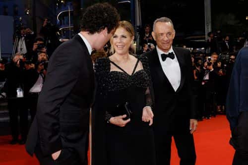 (L-R) Truman Hanks, Rita Wilson and Tom Hanks depart the 