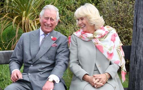 Prince Charles, Prince of Wales and Camilla, Duchess of Cornwall continue to laugh after a bubble bee took a liking to Prince Charles during their visit to the Orokonui Ecosanctuary on November 5, 2015 in Dunedin, New Zealand. The Royal couple are on a 12-day tour visiting seven regions in New Zealand and three states and one territory in Australia. (Photo by Rob Jefferies/Getty Images)