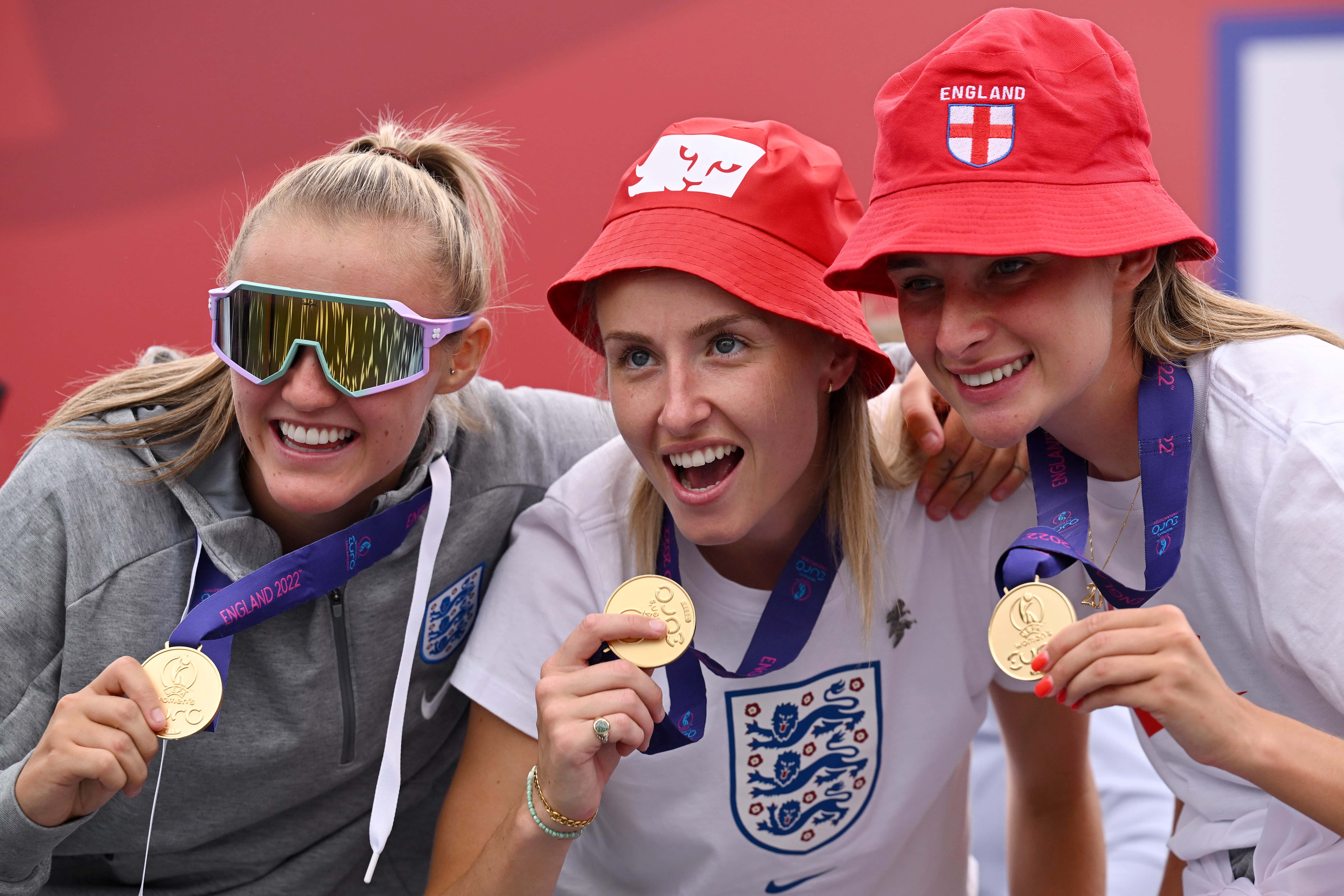 Georgia Stanway, Leah Williamson and Ella Toone of England celebrate with their medals during the England Women's Team Celebration at Trafalgar Square on August 01, 2022 in London, England. The England Women's Football team beat Germany 2-1 in the Final of The UEFA European Women's Championship last night at Wembley Stadium. (Photo by Leon Neal/Getty Images)