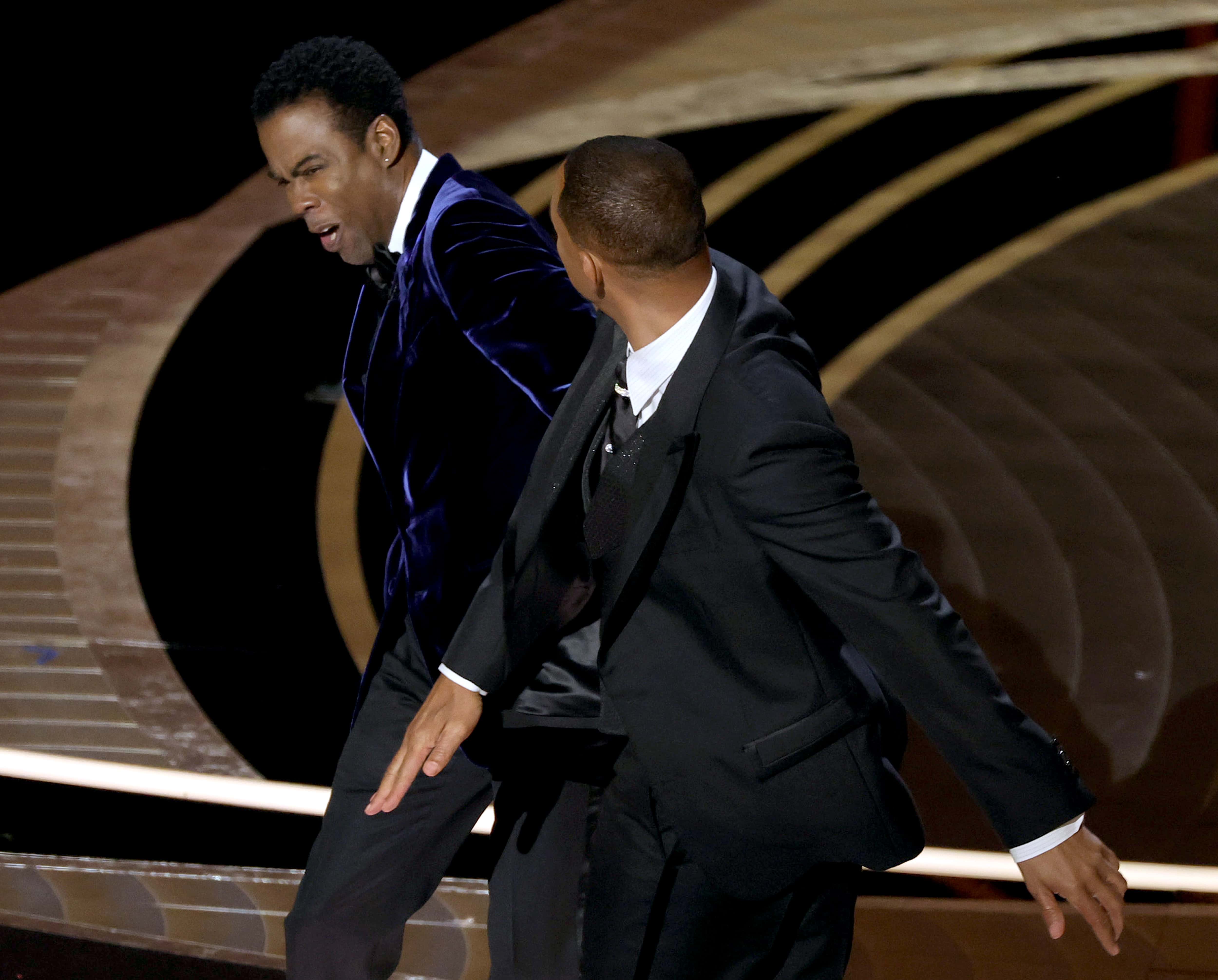 Will Smith appears to slap Chris Rock onstage during the 94th Annual Academy Awards at Dolby Theatre on March 27, 2022 in Hollywood, California.