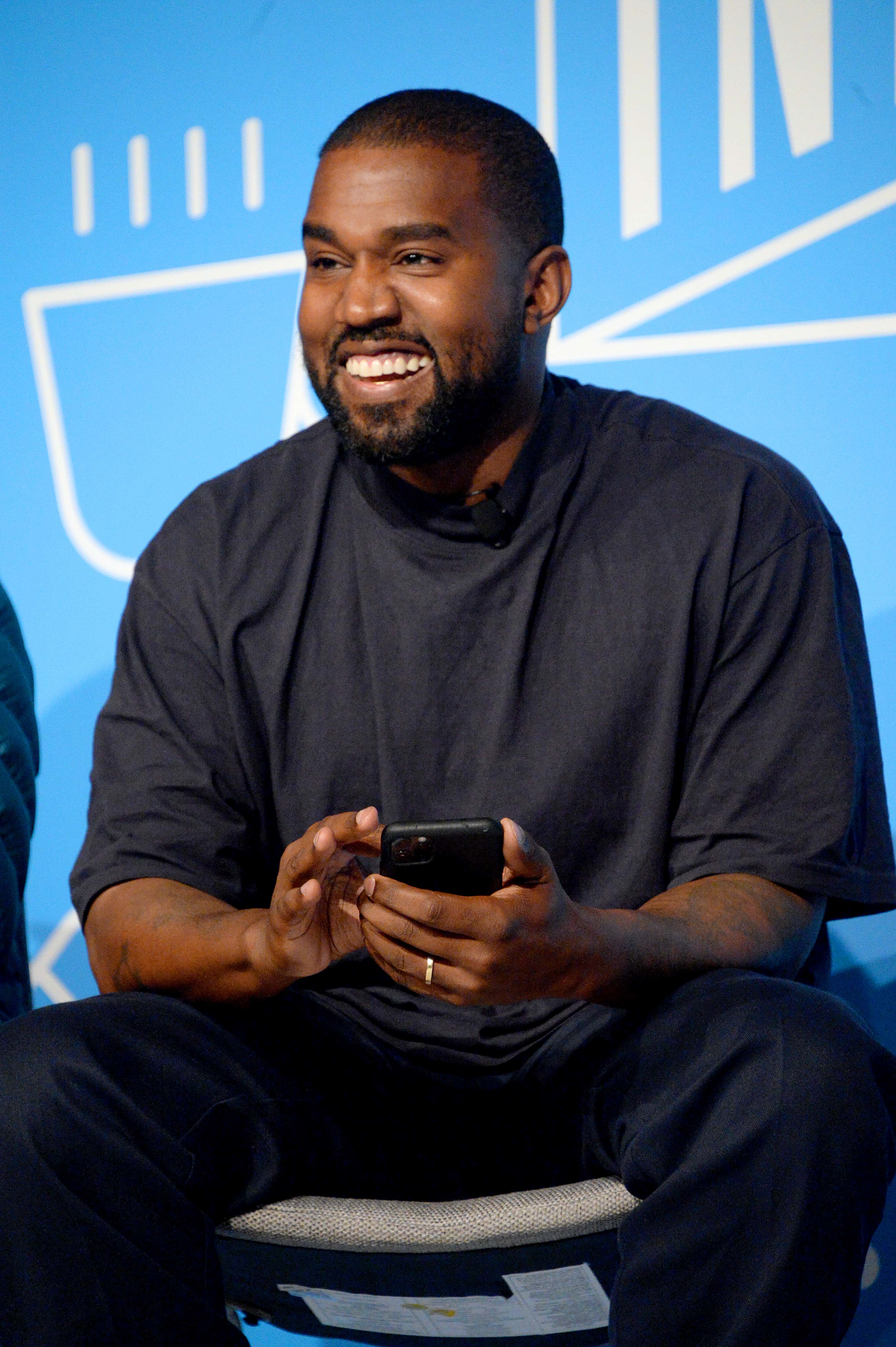 Kanye West speaks on stage at the