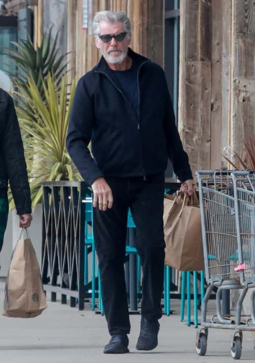 The ‘Tomorrow Never Die’ star styled his dashing look with a pair of dark trousers and a solid navy blue T-shirt (backgrid)