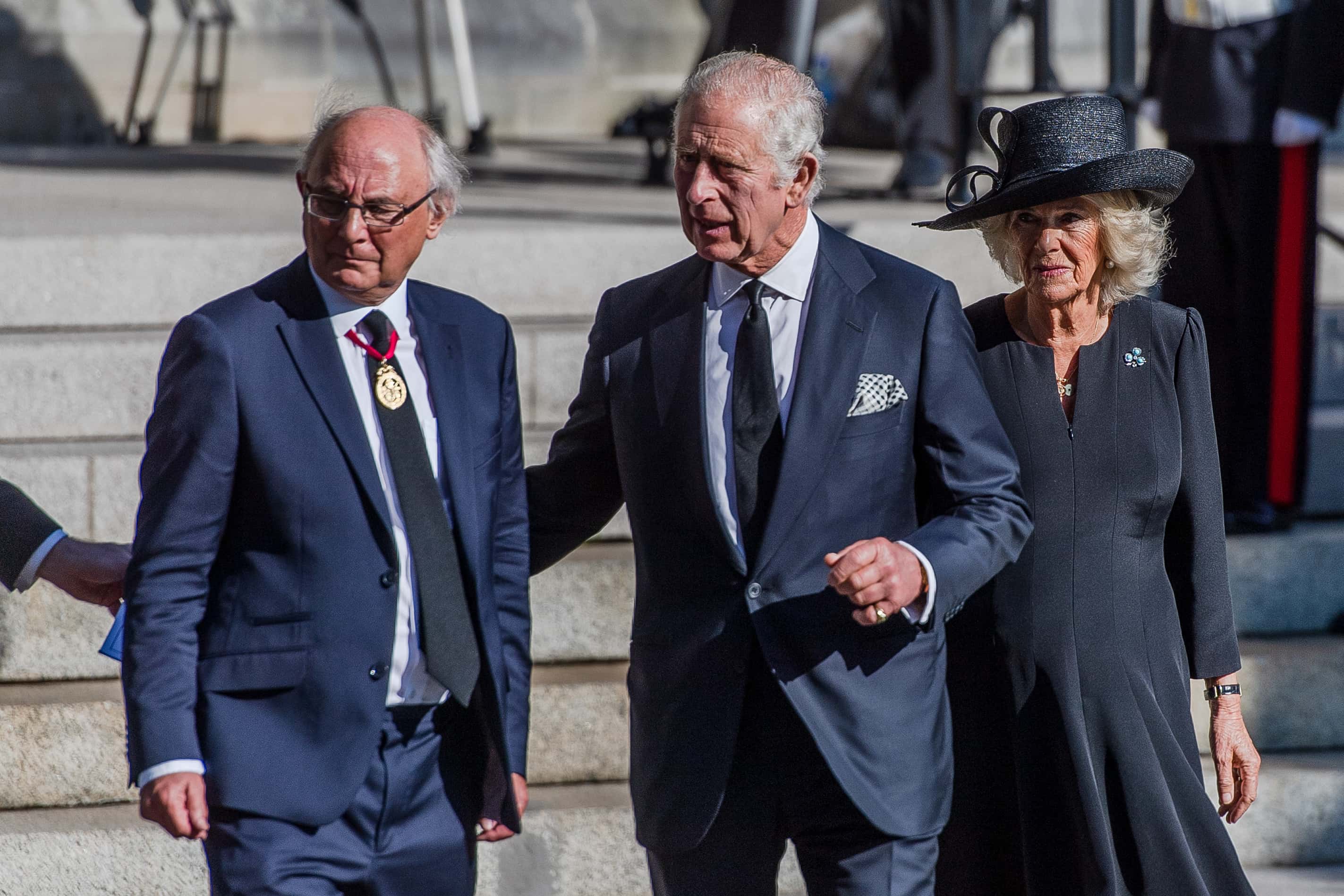 King Charles III and Camilla, Queen Consort, depart St Anne's Cathedral following a service of reflection in memory of Queen Elizabeth II on September 13, 2022 in Belfast, Northern Ireland. King Charles III is visiting Northern Ireland for the first time since ascending the throne following the death of his mother, Queen Elizabeth II, who died at Balmoral Castle on September 8, 2022. (Photo by Carrie Davenport/Getty Images)
