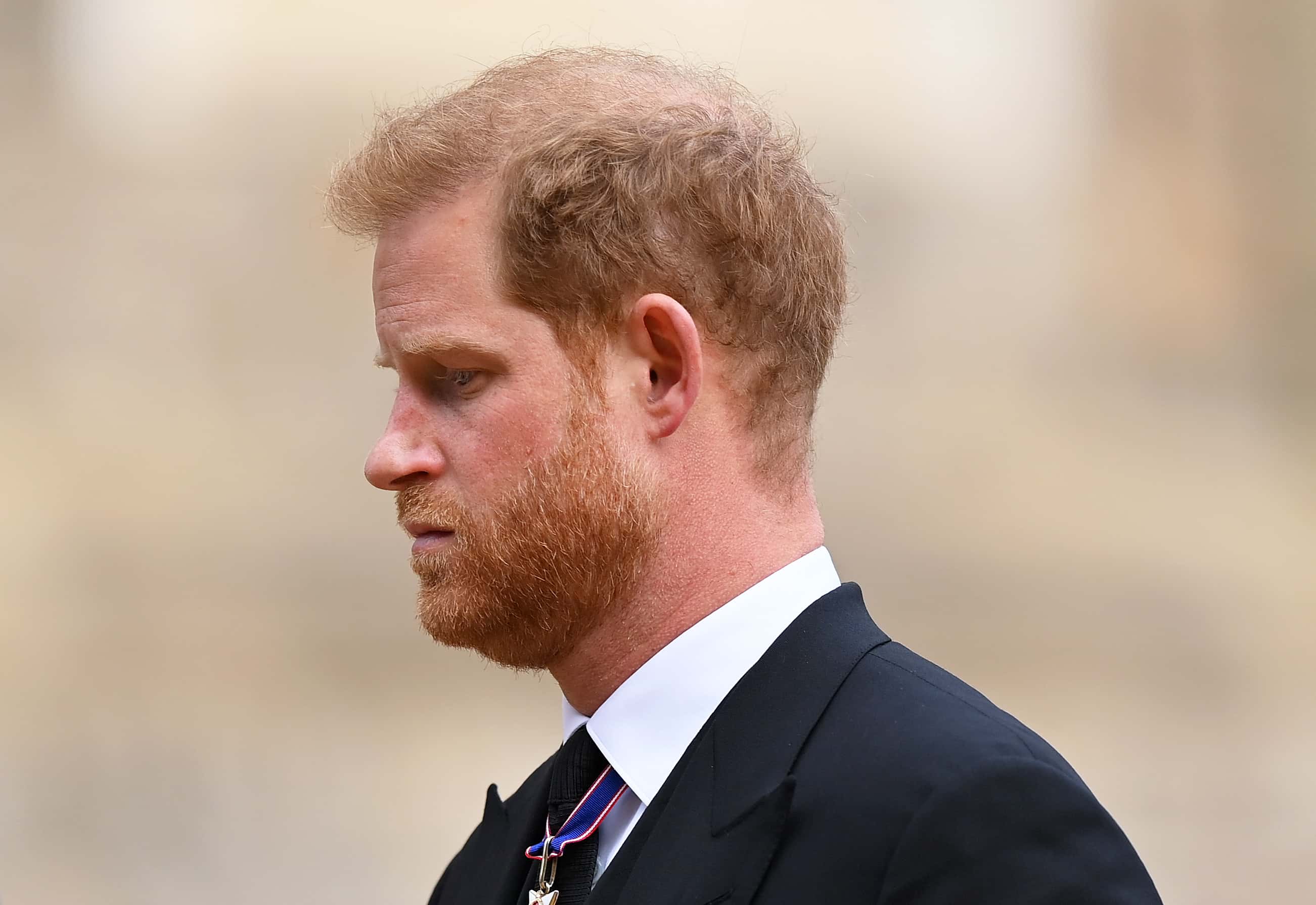 Prince Harry, Duke of Sussex as he joined the Procession following the State Hearse carrying the coffin of Queen Elizabeth II towards St George's Chapel on September 19, 2022 in Windsor, England. The committal service at St George's Chapel, Windsor Castle, took place following the state funeral at Westminster Abbey. A private burial in The King George VI Memorial Chapel followed. Queen Elizabeth II died at Balmoral Castle in Scotland on September 8, 2022, and is succeeded by her eldest son, King Charles III.