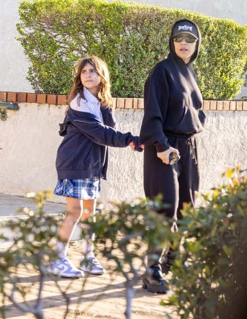 The 43-year-old creator of POOSH appeared incognito, wearing a black sweatshirt with the hood up over a The Viper Room cap. (Backgrid)