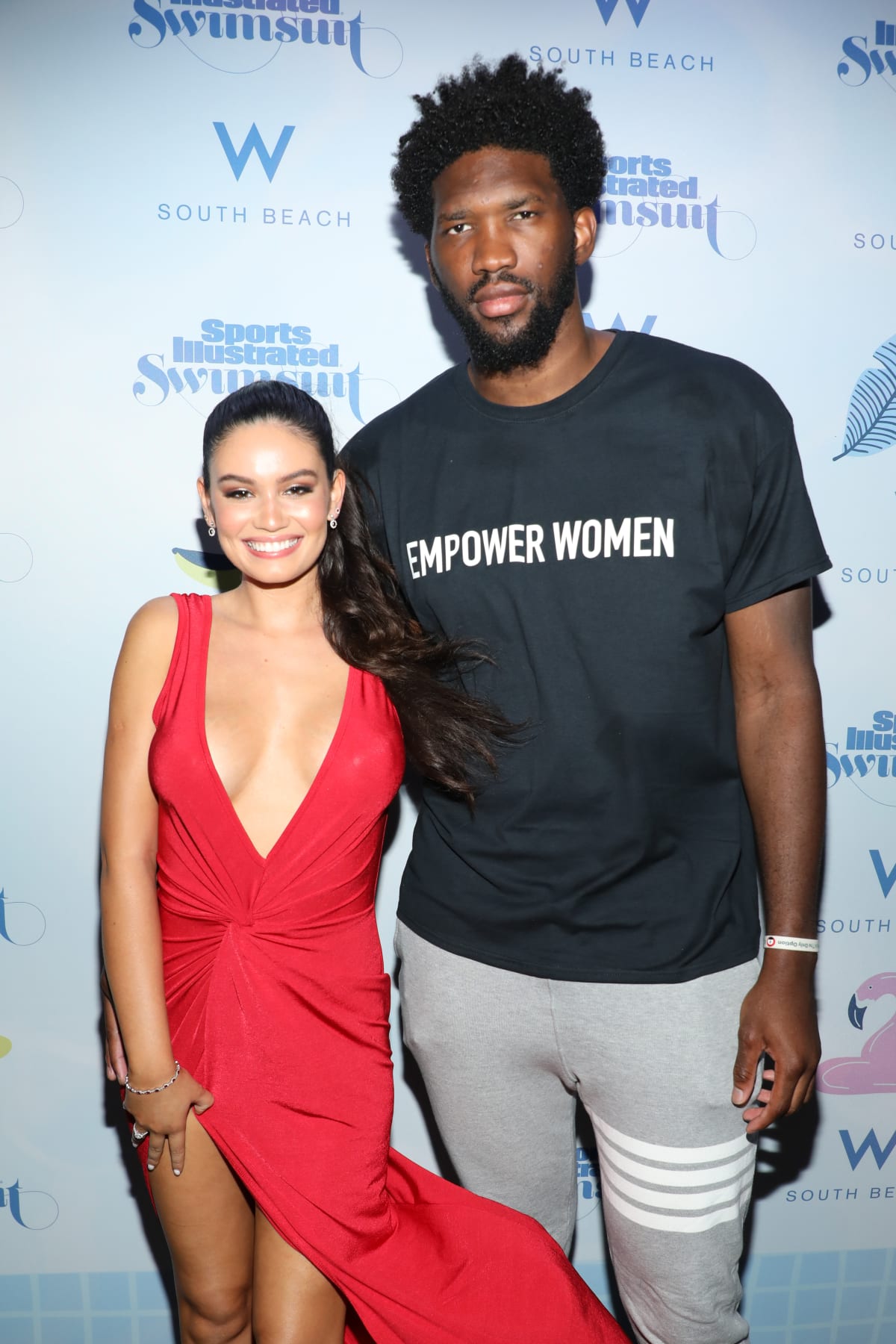 Anne de Palma and Joel Embiid attend the 2019 Sports Illustrated Swimsuit Runway Show During Miami Swim Week At W South Beach - Front Row/Backstage at WET poolside lounge at W South Beach on July 14, 2019 in Miami Beach, Florida. (Photo by Alexander Tamargo/Getty Images for Sports Illustrated)