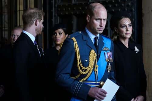 Prince William, Prince of Wales with Catherine, Princess of Wales and Prince Harry with Meghan, Duchess of Sussex leave after escorting the coffin of Queen Elizabeth II to Westminster Hall from Buckingham Palace for her lying in state, on September 14, 2022 in London, United Kingdom. Queen Elizabeth II's coffin is taken in procession on a Gun Carriage of The King's Troop Royal Horse Artillery from Buckingham Palace to Westminster Hall where she will lay in state until the early morning of her funeral. Queen Elizabeth II died at Balmoral Castle in Scotland on September 8, 2022, and is succeeded by her eldest son, King Charles III.
