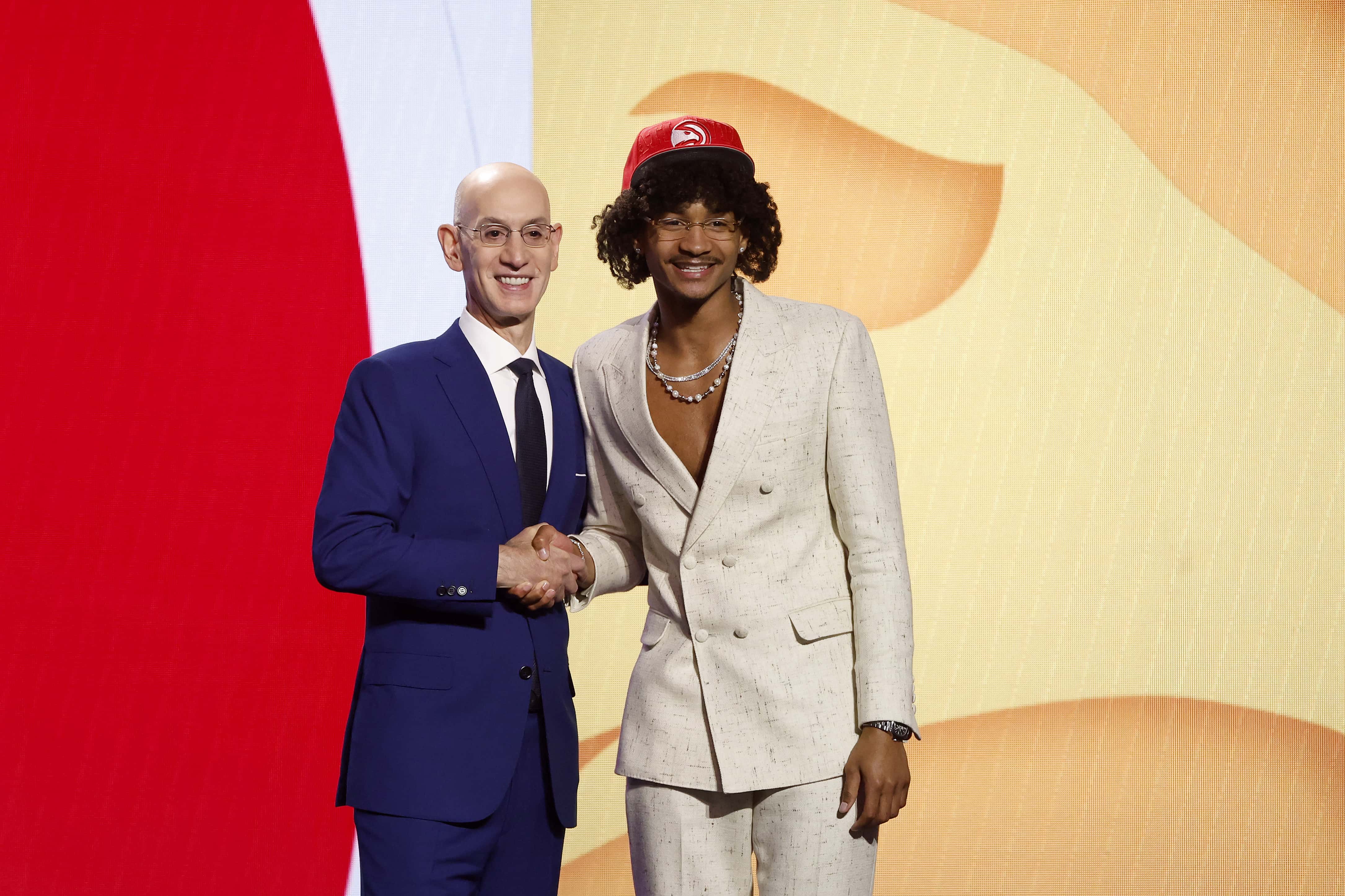 Kobe Bufkin (R) poses with NBA commissioner Adam Silver (L) after being drafted 15th overall pick by the Atlanta Hawks during the first round of the 2023 NBA Draft at Barclays Center on June 22, 2023, in the Brooklyn borough of New York City. (Photo by Sarah Stier/Getty Images)