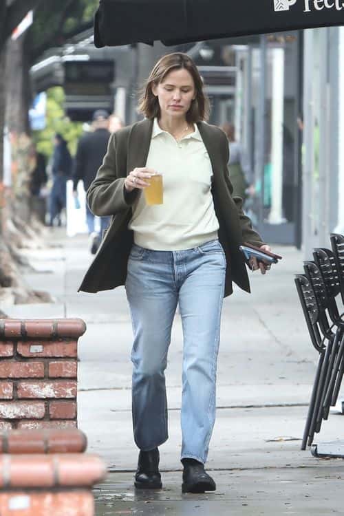 Jennifer also opted for a casual ensemble, featuring a pair of light wash, straight-leg jeans along with a pair of on-trend black loafers. (Backgrid)