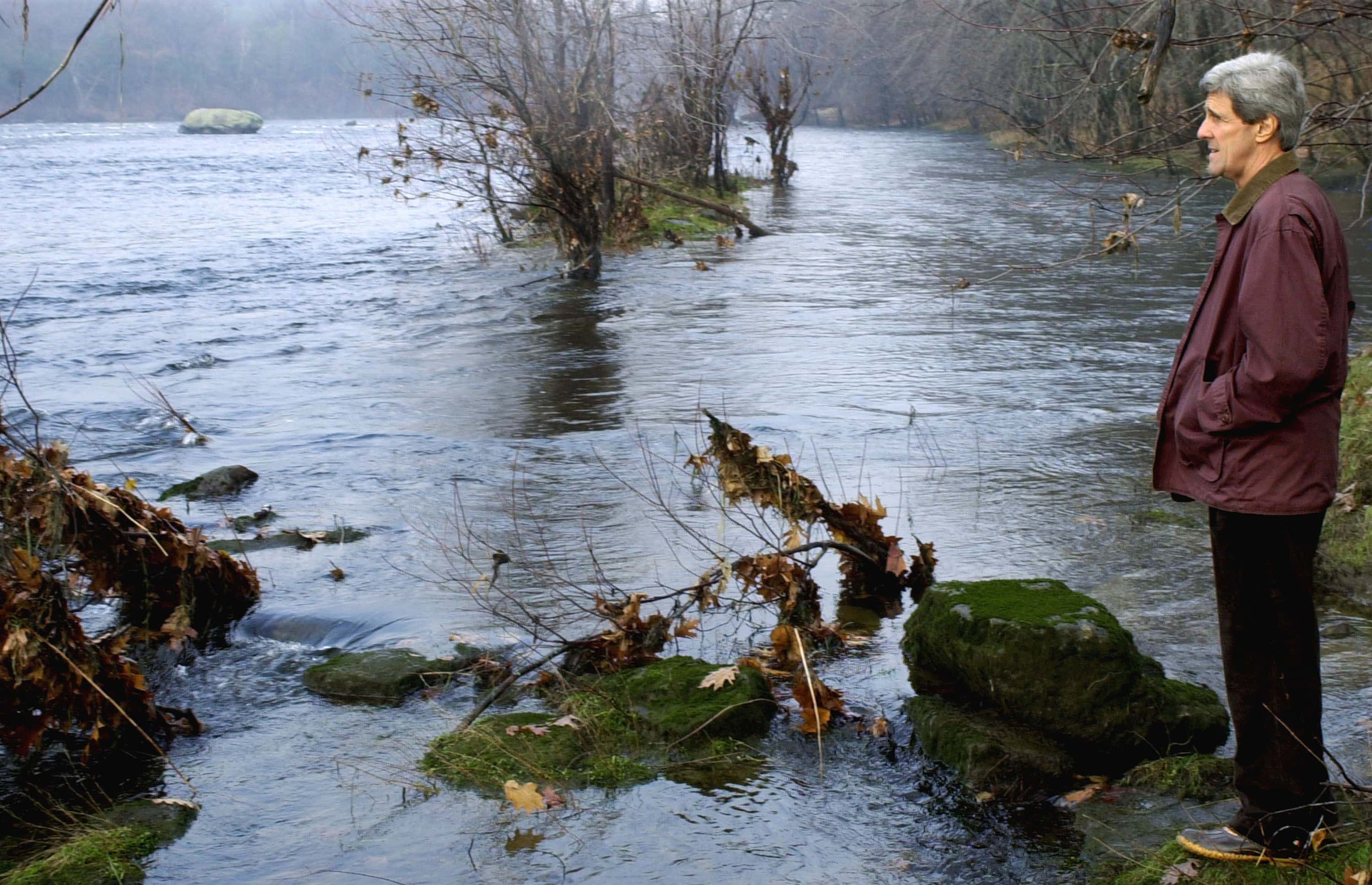LITCHFIELD, NH - NOVEMBER 12: Democratic presidential candidate U.S. Sen. John Kerry (D-MA) spends a moment on the bank of the Merrimack River November 12, 2003 in Litchfield, New Hampshire. Trailing in the polls with less then three months left before the New Hampshire primary, Kerry went to the site to outline his plans to restore America's air and waters, but faced repeated questions from reporters about the recent shake-up in his campaign staff. (Photo by Michael Springer/Getty Images)
