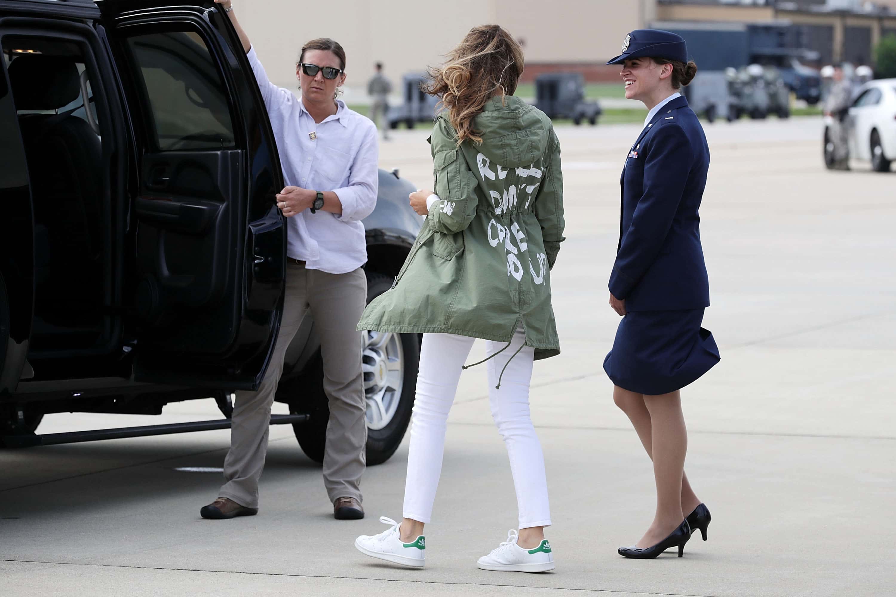 U.S. first lady Melania Trump (C) climbs back into her motorcade after traveling to Texas to visit facilities that house and care for children taken from their parents at the U.S.-Mexico border June 21, 2018 at Joint Base Andrews, Maryland. The first lady is traveling to Texas to see first hand the condition and treatment that children taken from their families at the border were receiving from the federal government. Following public outcry and criticism from members of his own party, President Donald Trump signed an executive order Wednesday to stop the separation of migrant children from their families, a practice the administration employed to deter illegal immigration at the U.S.-Mexico border.