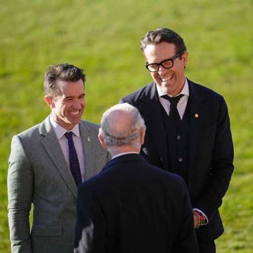 Co-Owners Wrexham AFC Rob McElhenney and Ryan Reynolds welcome King Charles III to their visit to Wrexham AFC on December 09, 2022 in Wrexham, Wales. Formed in 1864, Wrexham AFC is the third oldest professional football team in the world. The club was taken over by Hollywood actors Ryan Reynolds and Rob McElhenney in late 2020.