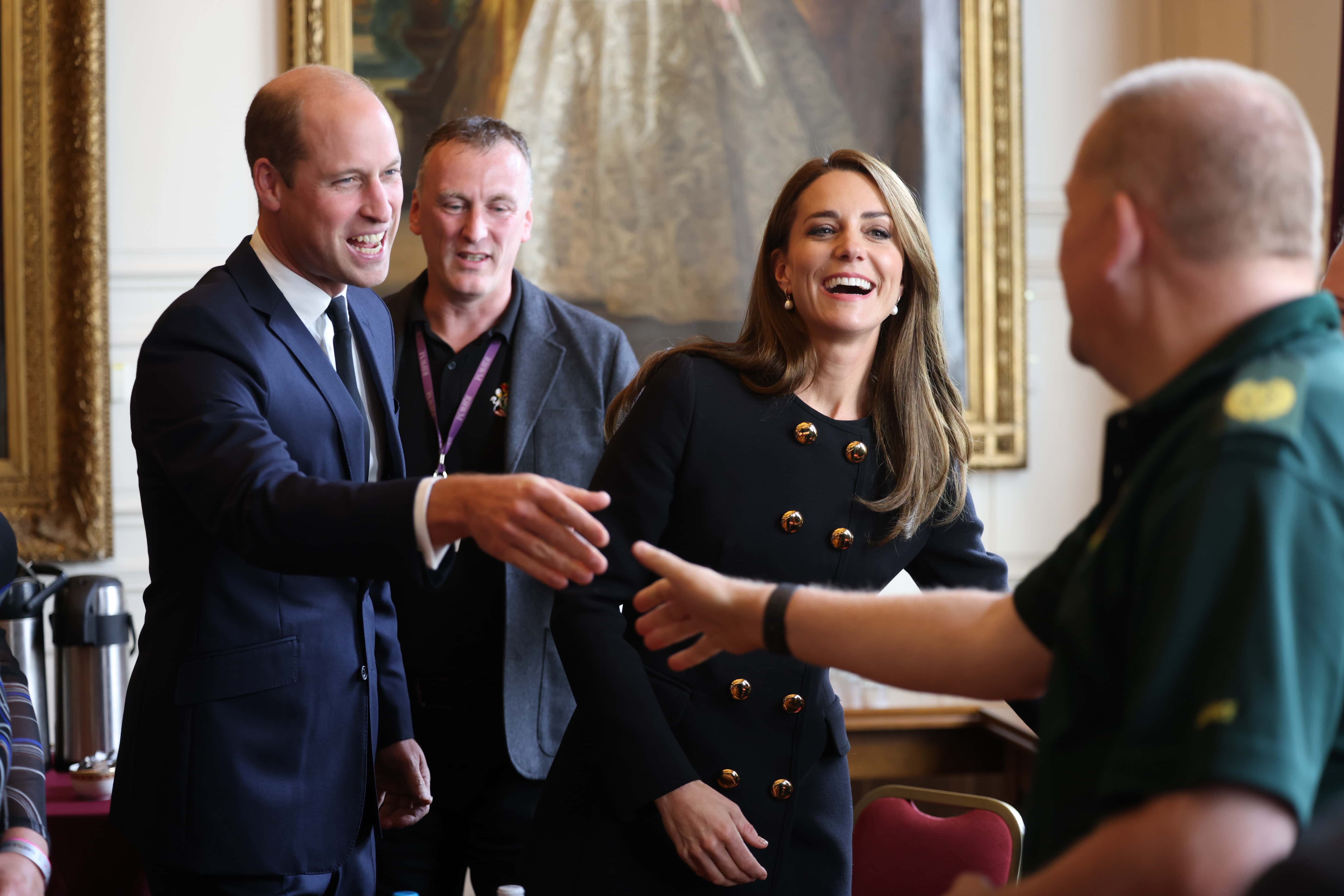 Prince William, Prince of Wales and Catherine, Princess of Wales visit the Windsor Guildhall to thank volunteers and operational staff involved in her Majesty Queen Elizabeth II's funeral on September 22, 2022 in Windsor, United Kingdom.