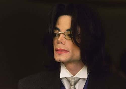 Singer Michael Jackson appears outside the courtroom at the Santa Maria Courthouse during a break in his child molestation trial May 23, 2005 in Santa Maria, California. Jackson is charged in a 10-count indictment with molesting a boy, plying him with liquor and conspiring to commit child abduction, false imprisonment and extortion.