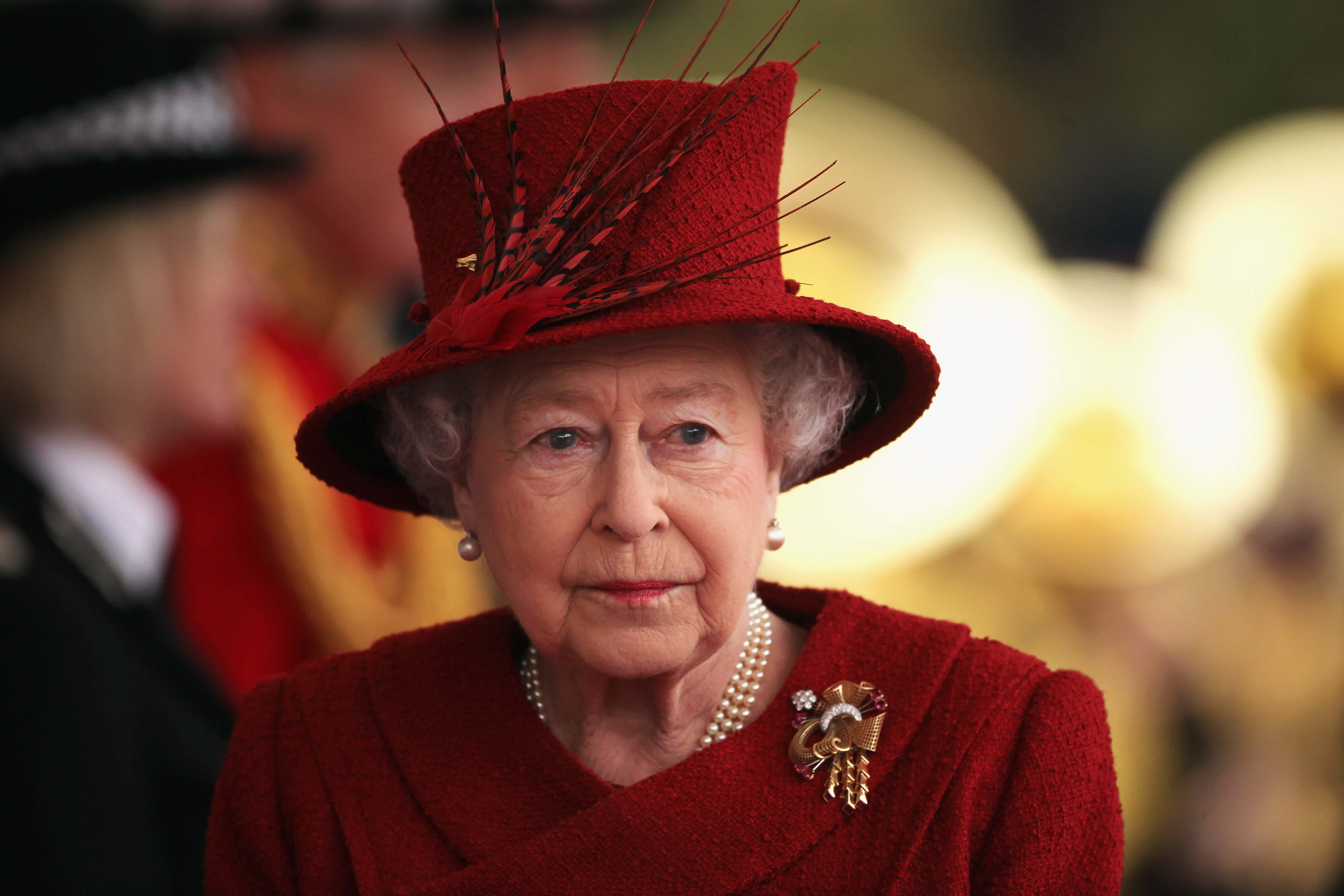 Queen Elizabeth II arrives to greet the Emir of Qatar, Sheikh Hamad bin Khalifa al Thani to her Windsor residence on October 26, 2010 in Windsor, England. The Sheikh is on a two day State visit to the UK, the first since 1985, which is seen as important in strengthening already strongly established business links with one of the Gulf States most financially powerful nations.