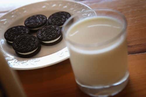 In this photo illustration, milk and cookies sit on a counter on December 27, 2012 in Chicago, Illinois. Milk prices could spike to $6 to $8 a gallon in January if lawmakers fail to reach a