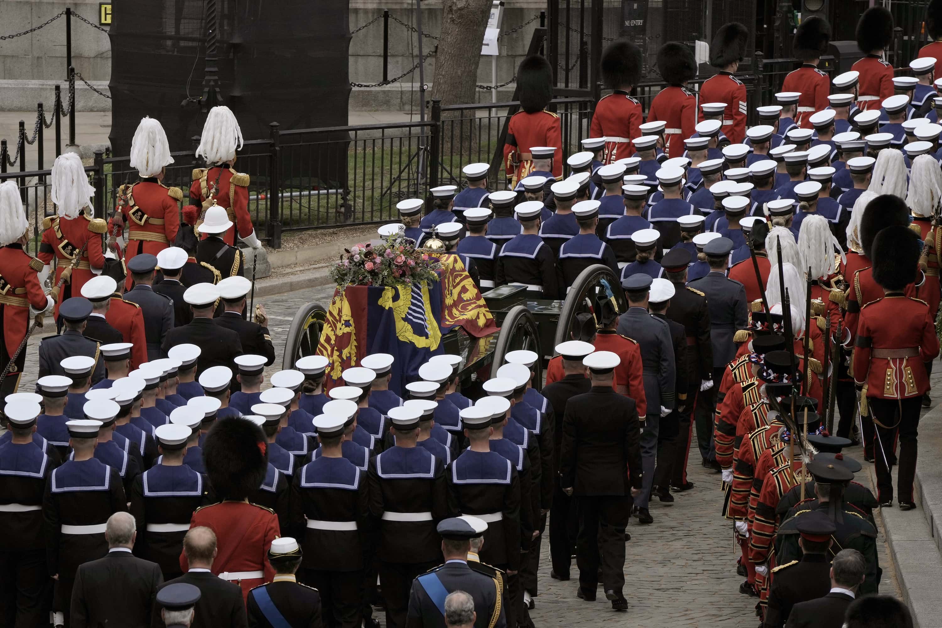 The coffin of Queen Elizabeth II leaves Westminster Hall for her funeral service in Westminster Abbey for her funeral service in Westminster Abbey during the state funeral and burial of Queen Elizabeth II at Westminster Abbey on September 19, 2022 in London, England. Elizabeth Alexandra Mary Windsor was born in Bruton Street, Mayfair, London on 21 April 1926. She married Prince Philip in 1947 and ascended the throne of the United Kingdom and Commonwealth on 6 February 1952 after the death of her Father, King George VI. Queen Elizabeth II died at Balmoral Castle in Scotland on September 8, 2022, and is succeeded by her eldest son, King Charles III. (Photo by Nariman El-Mofty - WPA Pool/Getty Images)