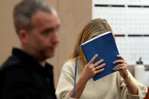 Actress Gwyneth Paltrow shields her face with a blue notebook as she exits a courtroom, where she is accused in a lawsuit of crashing into a skier during a 2016 family ski vacation, leaving him with brain damage and four broken ribs, March 21, 2023, in Park City, Utah. Terry Sanderson claims that the actor-turned-lifestyle influencer was cruising down the slopes so recklessly that they violently collided, leaving him on the ground as she and her entourage continued their descent down Deer Valley Resort, a skiers-only mountain known for its groomed runs, après-ski champagne yurts and posh clientele.