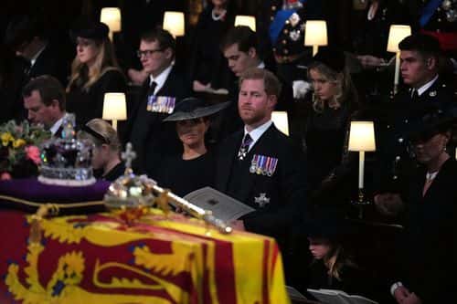 The Duchess of Sussex, the Duke of Sussex, Princess Charlotte, and the Princess of Wales during the Committal Service for Queen Elizabeth, at St George's Chapel in Windsor Castle on September 19, 2022 in Windsor, England. The committal service at St George's Chapel, Windsor Castle, took place following the state funeral at Westminster Abbey. A private burial in The King George VI Memorial Chapel followed. Queen Elizabeth II died at Balmoral Castle in Scotland on September 8, 2022, and is succeeded by her eldest son, King Charles III.