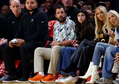 Adam Sandler and Sunny Sandler attend a game between the Atlanta Hawks and the Los Angeles Lakers in the first half at Crypto.com Arena on January 06, 2023 in Los Angeles, California.  NOTE TO USER: User expressly acknowledges and agrees that, by downloading and/or using this photograph, user is consenting to the terms and conditions of the Getty Images License Agreement.
