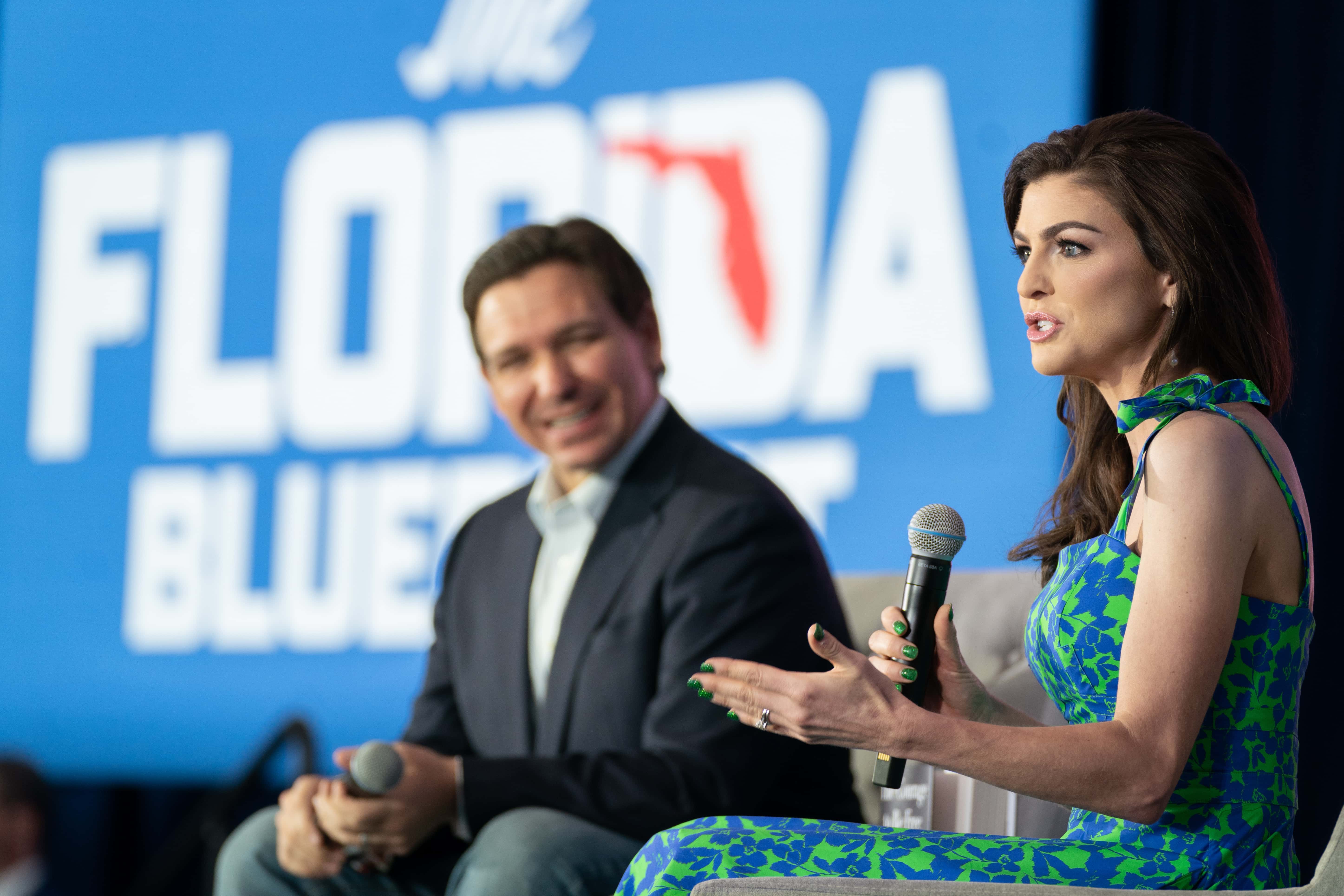 NORTH CHARLESTON, SC - APRIL 19: Florida Governor Ron DeSantis, left, and his wife, Casey DeSantis, speak to a crowd at the North Charleston Coliseum on April 19, 2023 in North Charleston, South Carolina. The Governor's appearance marks his first official visit to the 