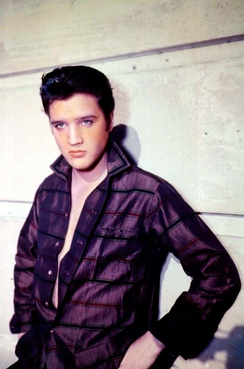 Singer Elvis Presley poses for a studio portrait.