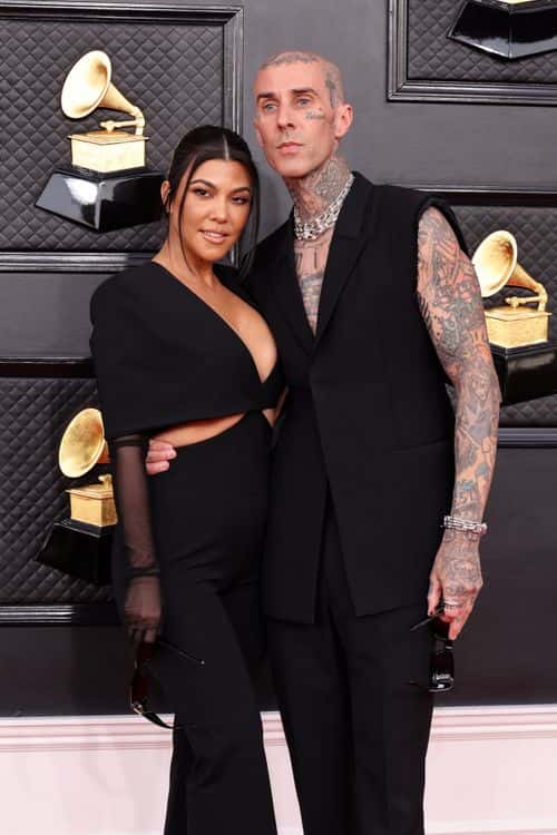 (L-R) Kourtney Kardashian and Travis Barker attend the 64th Annual GRAMMY Awards at MGM Grand Garden Arena on April 03, 2022 in Las Vegas, Nevada.