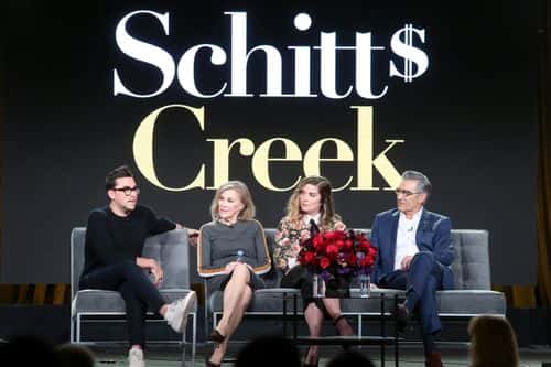 (L-R) Co-creator/Executive producer/Actor Daniel Levy, actors Catherine O'Hara and Annie Murphy, and co-creator/executive producer/actor Eugene Levy of 'Schitt's Creek' speak onstage during the POPTV portion of the 2018 Winter Television Critics Association Press Tour at The Langham Huntington, Pasadena on January 14, 2018 in Pasadena, California.