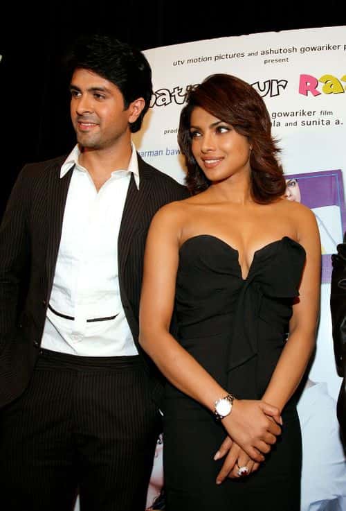 (L-R) Actors Harman Baweja and  Priyanka Chopra pose onstage at the 