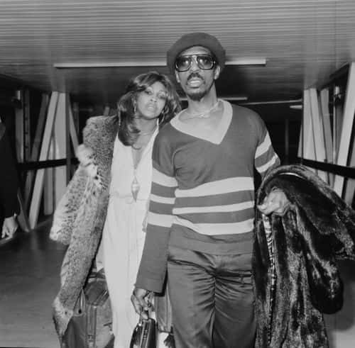 American musician Ike Turner (1931 - 2007) and American singer-songwriter Tina Turner at Heathrow Airport, London, UK, 27th October 1975. (Photo by Frederick R. Bunt/Evening Standard/Hulton Archive/Getty Images)