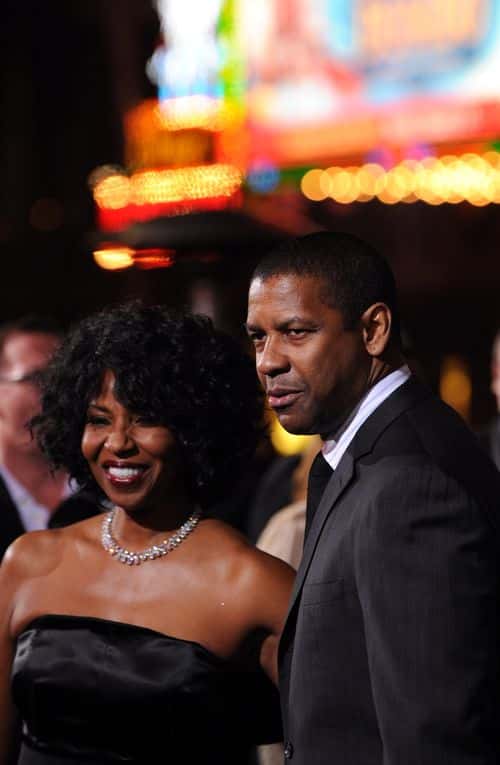 Actor Denzel Washington and Pauletta Washington arrive at the Premiere Of Warner Bros.