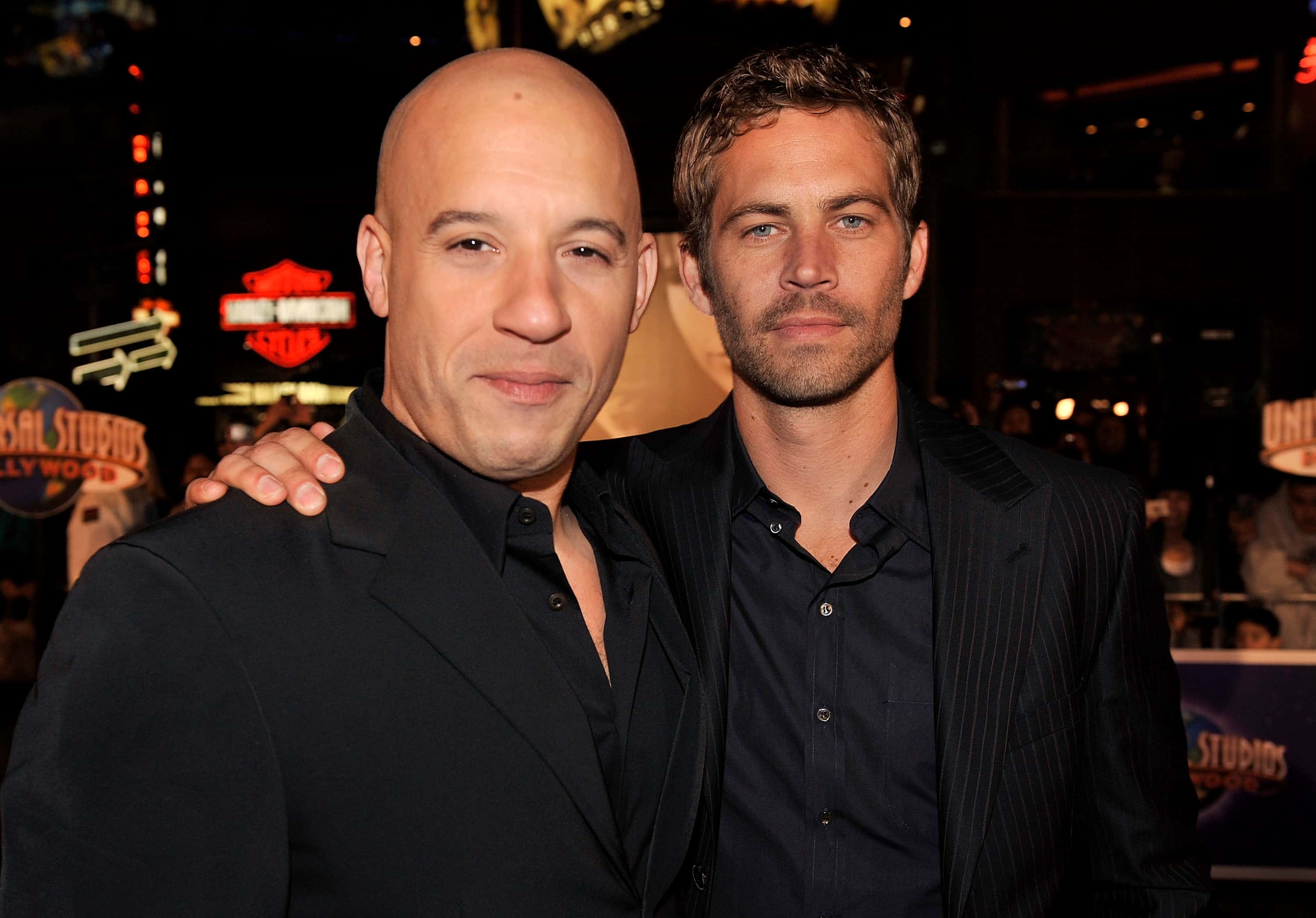 UNIVERSAL CITY, CA - MARCH 12: Actors Vin Diesel (L) and Paul Walker arrive at the premiere Universal's 
