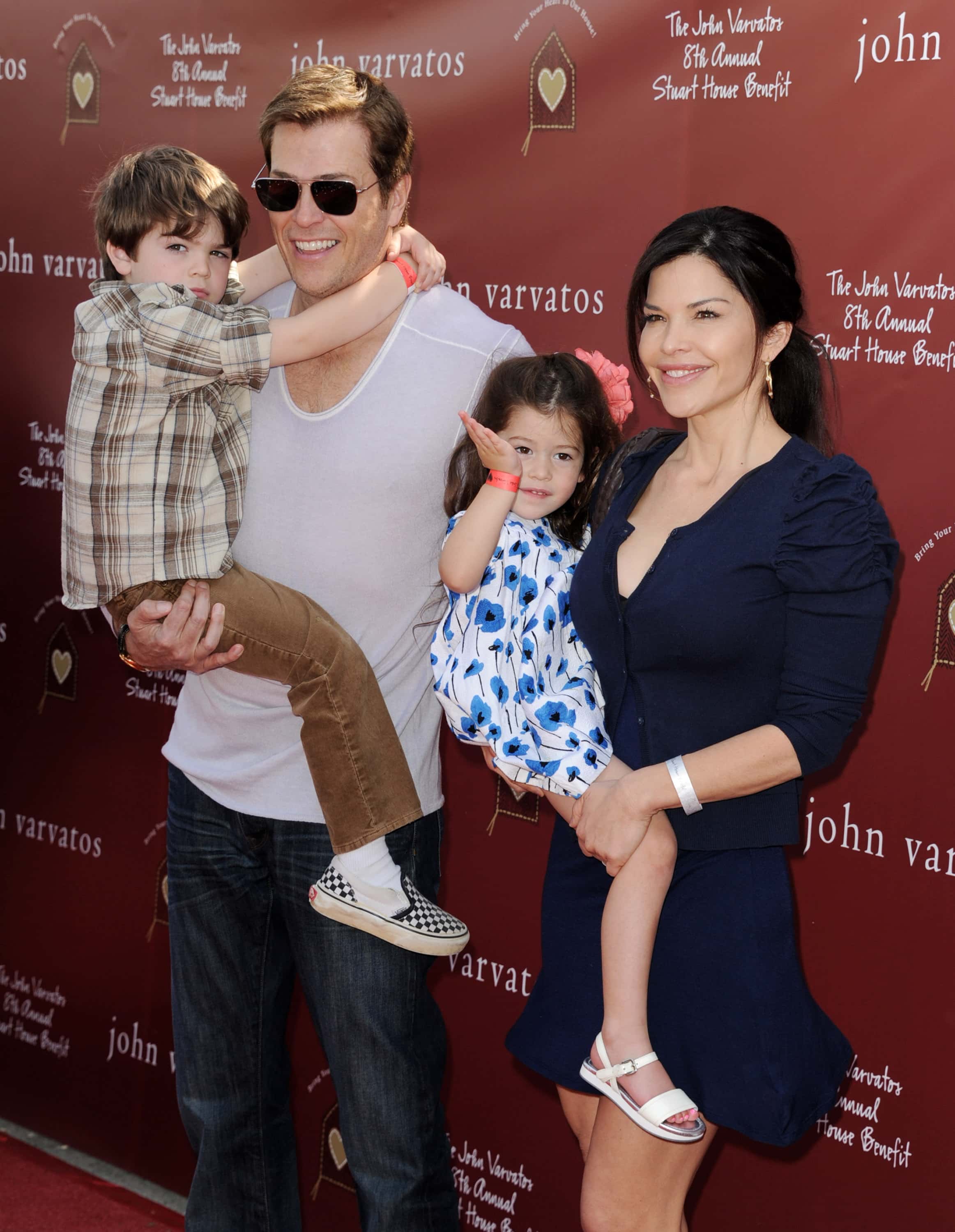 WEST HOLLYWOOD, CA - MARCH 13: Agent Patrick Whitesell (L), his wife Lauren Sanchez and their children Evan and Ella arrive at John Varvatos' 8th Annual Stuart House Benefit at the John Varvatos Boutique on March 13, 2011 in West Hollywood, California. (Photo by Kevin Winter/Getty Images)
