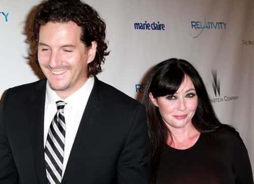 Actress Shannon Doherty (R) and photographer Kurt Iswarienko arrives at The Weinstein Company And Relativity Media's 2011 Golden Globe Awards Party held at The Beverly Hilton hotel on January 16, 2011 in Beverly Hills, California.