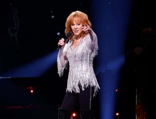 Reba McEntire performs at Bridgestone Arena on October 21, 2022 in Nashville, Tennessee. (Photo by Jason Kempin/Getty Images)
