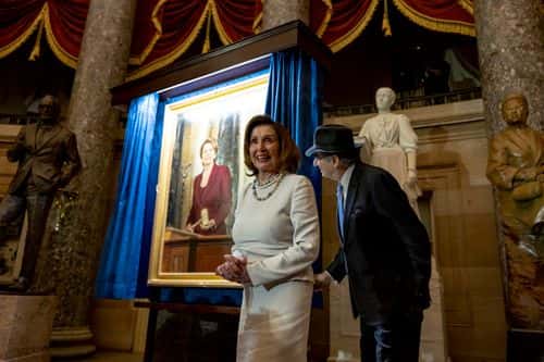 Speaker of the House Nancy Pelosi (D-CA) and her husband Paul unveil her portrait during an unveiling ceremony in Statuary Hall at the U.S. Capitol on December 14, 2022 in Washington, DC. Pelosi’s portrait is an oil painting on canvas and painted by Ronald Sherr. Speaker Pelosi recently announced her intent to step down from leadership in the House Democratic Caucus for the 118th schedule and is in the last couple weeks of her tenure as Speaker of the House.