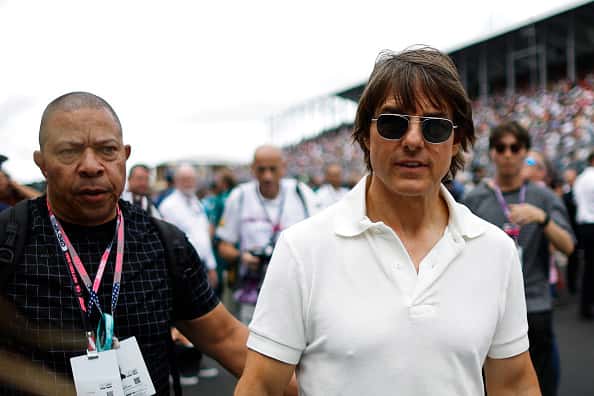 MIAMI, FLORIDA - MAY 07: Tom Cruise walks on the grid during the F1 Grand Prix of Miami at Miami International Autodrome on May 07, 2023 in Miami, Florida. (Photo by Chris Graythen/Getty Images)