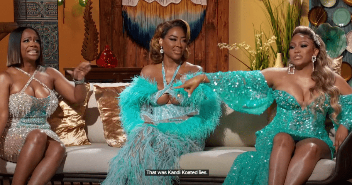 Drew Sidora (R) and Kandi Burruss' (L) argument intensifies as Drew tries to refute claims that she cheated on Ralph Pattman in 'RHOA' Season 15 Reunion (YouTube/Bravo)