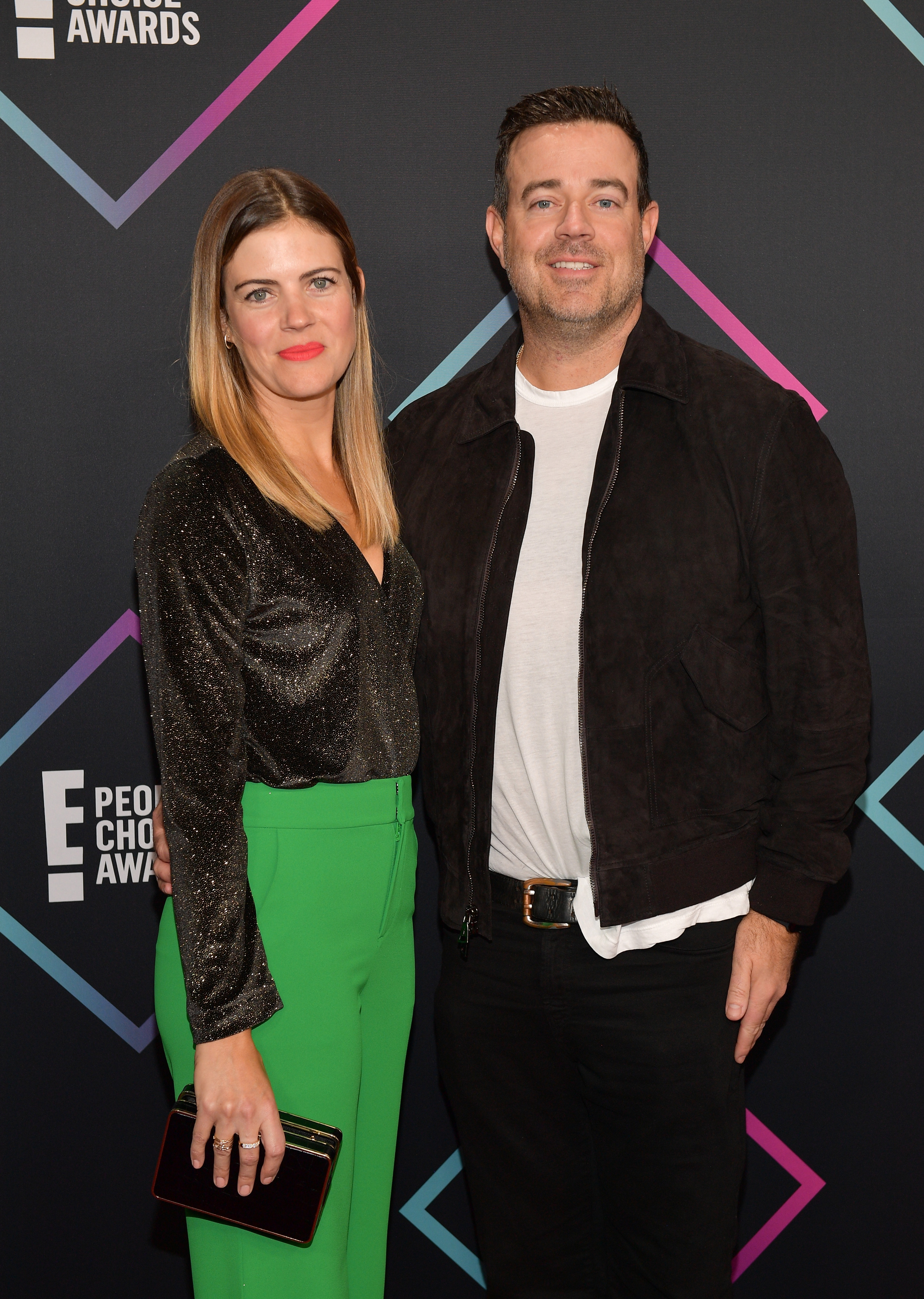 Siri Pinter (L) and Carson Daly attend the People's Choice Awards 2018 at Barker Hangar on November 11, 2018 in Santa Monica, California.