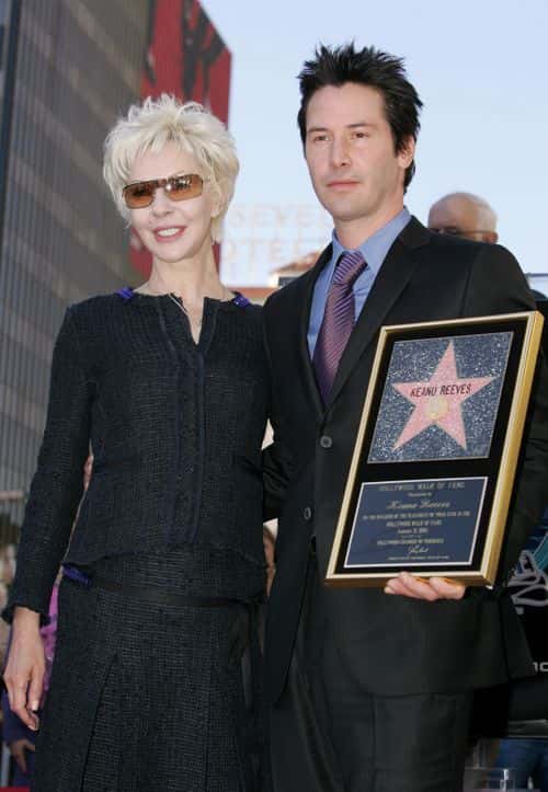 Actor Keanu Reeves and his mother Patrica Taylor pose at the ceremony honoring him with a star on the Hollywood Walk of Fame on January 31, 2005 in Hollywood, California.