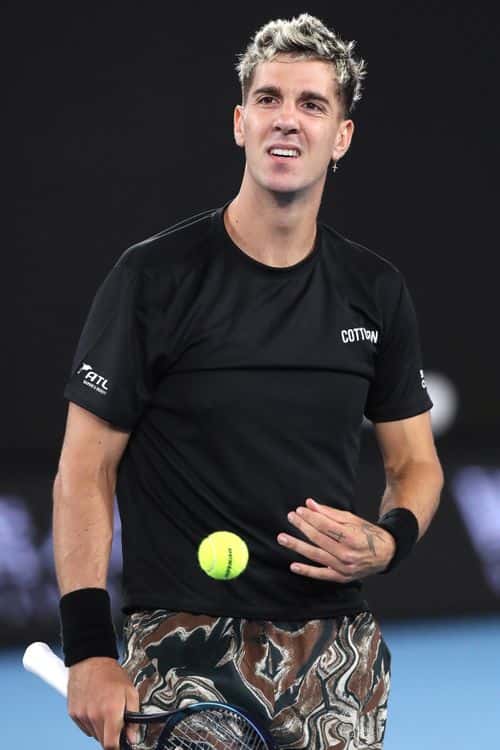 Thanasi Kokkinakis of Australia reacts in their round two singles match against Andy Murray of Great Britain during day four of the 2023 Australian Open at Melbourne Park on January 19, 2023 in Melbourne, Australia.