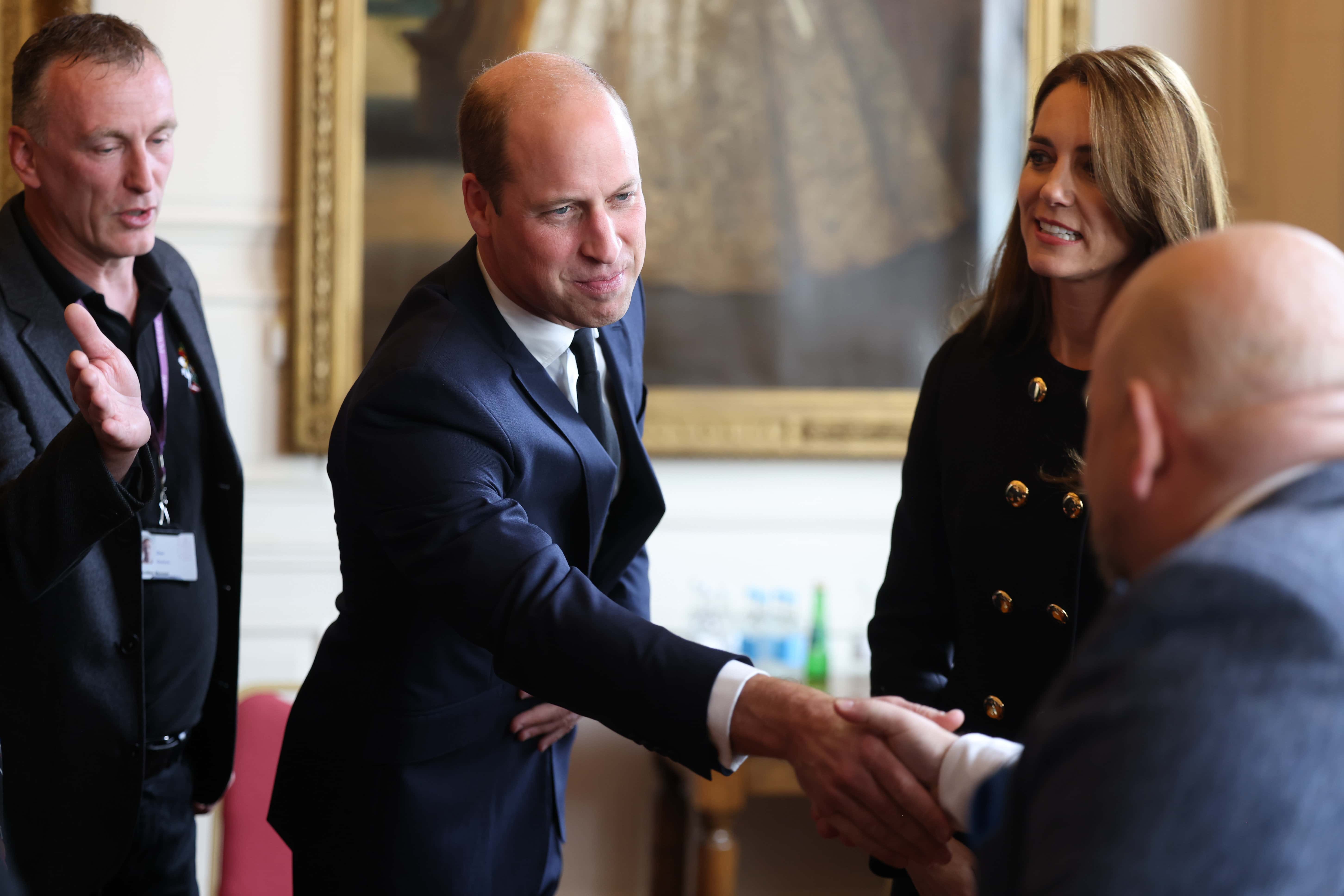 Prince William, Prince of Wales and Catherine, Princess of Wales visit the Windsor Guildhall to thank volunteers and operational staff involved in her Majesty Queen Elizabeth II's funeral on September 22, 2022 in Windsor, United Kingdom.