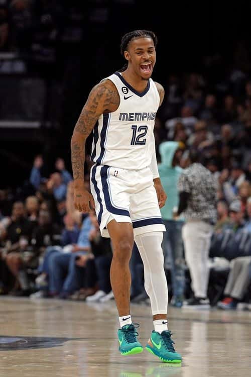 MEMPHIS, TENNESSEE - OCTOBER 19: Ja Morant #12 of the Memphis Grizzlies reacts during the first half