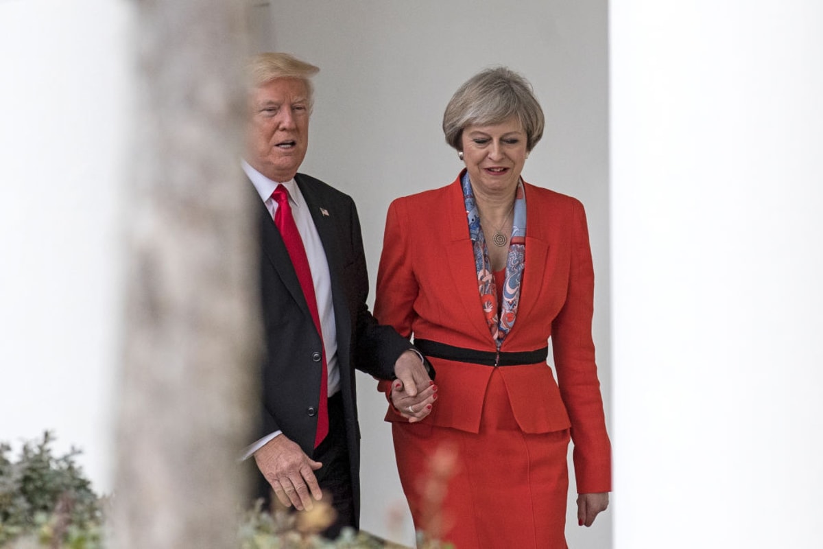 British Prime Minister Theresa May and U.S. President Donald Trump walk along The Colonnade of the West Wing at The White House on (Photo by Christopher Furlong/Getty Images)