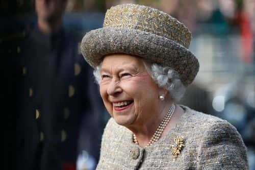 Queen Elizabeth II smiles as she arrives before the Opening of the Flanders' Fields Memorial Garden at Wellington Barracks on November 6, 2014 in London, England.